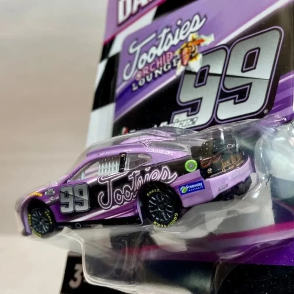 Nascar Authentics Tootsies Daniel Sua'rez 99 Wave 06 SKU-27661 Race Car NIP 2023